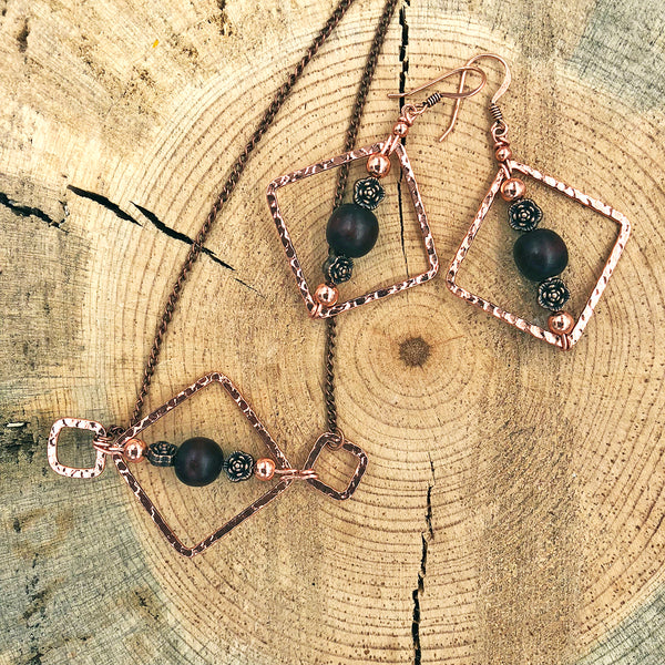 Geometric Necklace with Wood Bead and Metallic Floral Accents
